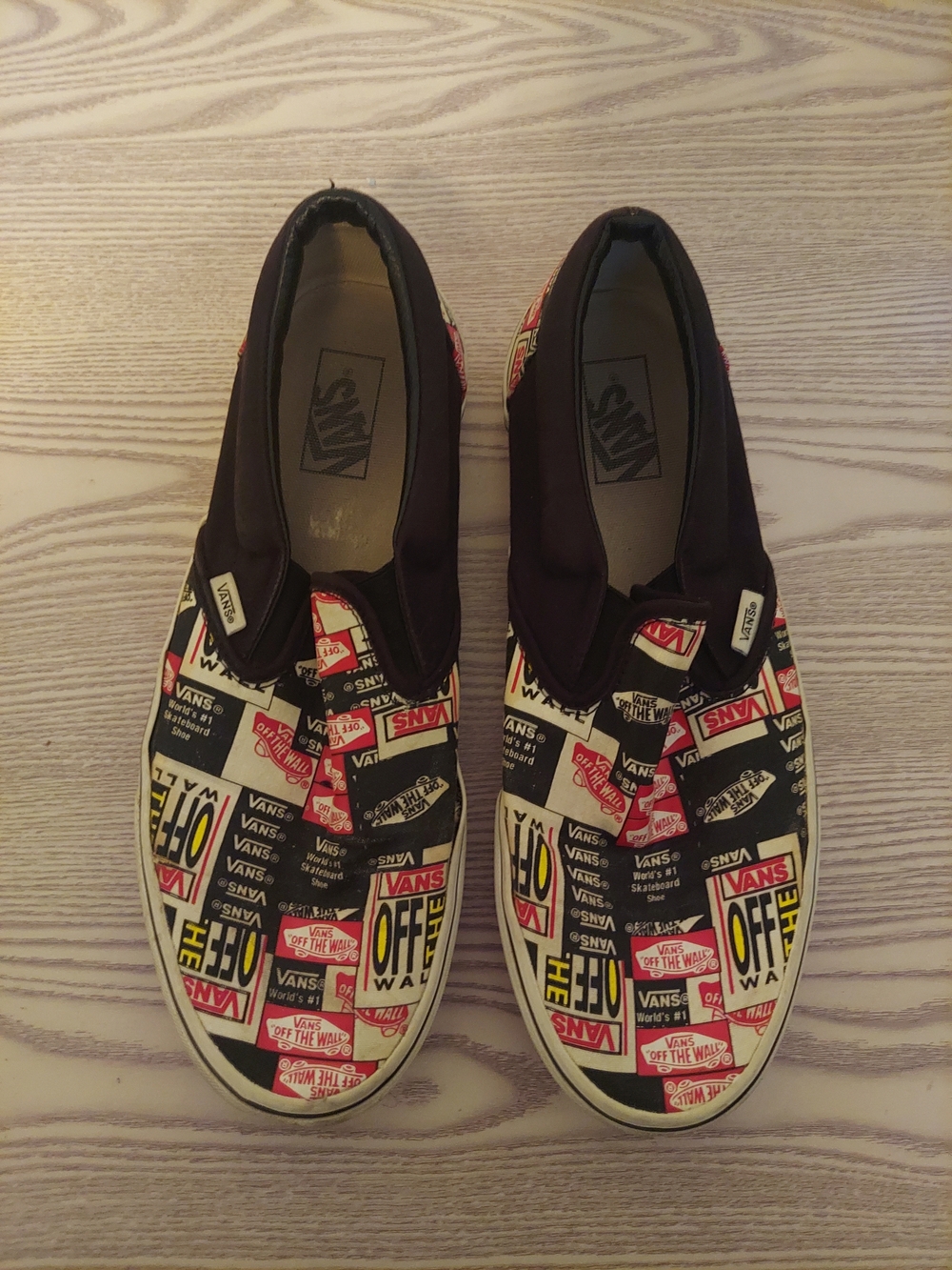 Vans Slip-On Sneakers with Black, White, Red and Yellow Logo Collage